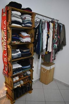 a closet filled with lots of clothes and shoes