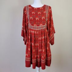 Lin Jia & Shop Boho Dress Nwt Size Small 85 % Polyester 15% Spandex Color Red With A Beautiful Framed Pattern In Center Front. Perfect Dress For Any Season Smoke Free Pet Free Home B19 Boho, Bohemian, Hippie Chic, Patterned, Wide Sleeves, Cottagecore, Grandmacore, Casual, Pictures, Flowy, Loose Fitting Red Stretch Floral Mini Dress, Red Stretch Mini Dress With Floral Print, Stretch Red Mini Dress With Floral Print, Red Stretch Floral Print Dress, Casual Red Viscose Dress, Casual Red Rayon Dress, Red Bohemian Midi Dress, Red Long Sleeve Rayon Dress, Fitted Red Rayon Dress