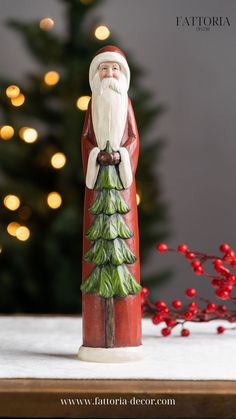 Beautiful Santa Figurine. The realistic painted finish paired with the traditional red, white, and green color scheme and pine tree accent Lime Powder, Green Color Scheme, Santa Carving, Simple Wood Carving, Santa Patterns, Green Color Schemes, Santa Figurines, Christmas Decorations Living Room, Wood Carving Patterns