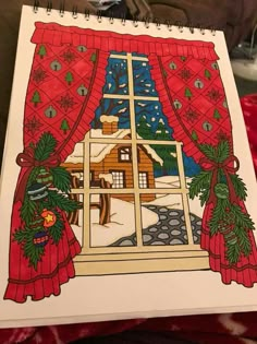 a drawing of a window with christmas decorations on the windowsill and a house in the background