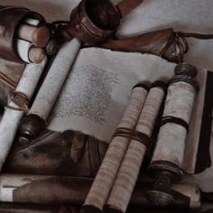 an open book surrounded by old objects