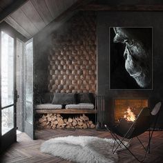 a living room filled with furniture and a fire place in front of a wall mounted fireplace