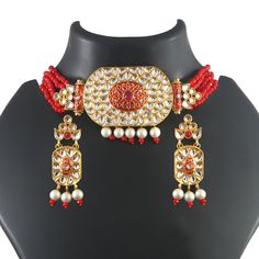 This is a stunning handmade choker necklace perfect for high end Jewelry Collector, a keeper in Traditional Vintage Indian/Pakistani Bridal jewelry and a Luxury Gift for your Daughter, Sister or Wife on Wedding or Anniversary. Perfect for any type of occasions, weddings And celebrations and a beautiful & memorable gift for weddings and special occasions. Description  Item Code:- L6105 Gold Plated Fine Kundan & Red Beaded Choker Necklace Necklace Measures- Adjustable with a Dori/Cord Earring Measures- 62x21mm approx Quantity- One Necklace Set Please see more different designs here:- https://www.etsy.com/in-en/shop/LUCKYJEWELSART?ref=seller-platform-mcnav I make every item of my collection with a lot of love and care, I pay attention to every detail.  You are more than welcome to contact me Luxury Red Pearl Necklace For Wedding, Luxury Traditional Red Bridal Necklace, Luxury Red Kundan Necklace For Gift, Luxury Red Kundan Necklace For Gifting, Cuff Necklace, Handmade Choker Necklace, Pakistani Bridal Jewelry, High End Jewelry, Kundan Choker