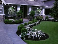 a house with landscaping in the front yard