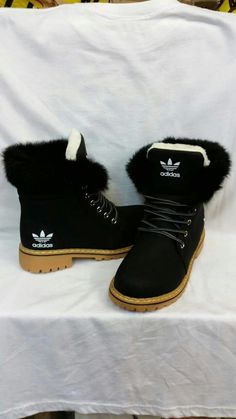 Black winter boots Adidas Shoes Black, Black Adidas Shoes, Brown Winter Boots, Timberland Boot, Timberland Boots Outfit, Timberland Waterproof Boots, Adidas Boots, Fuzzy Boots, Yellow Boots