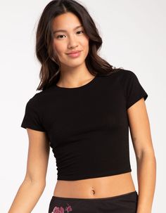 Tilly's Baby Tee. A Versatile And Stylish Staple. Solid Wash. Scoop Neckline. Short Sleeve. Fitted Silhouette. Cropped Fit. 95% Cotton, 5% Spandex. Machine Wash. Imported. Model Is Wearing A Size Small. Model Measurements:height: 5'6" Bust: 32"waist: 26"hips: 35" | Tillys Baby Tee Cheap White Gap Tops, Cheap Basic Blue Cropped T-shirt, Affordable Basic Gap T-shirt, Cheap Fitted Calvin Klein Shirt, Cheap Cropped Tank Top Forever 21, Cheap Gap Relaxed Fit T-shirt, Forever 21 Cheap Cropped Tank Top, Black Baby Tee Outfit, Clothing Necessities