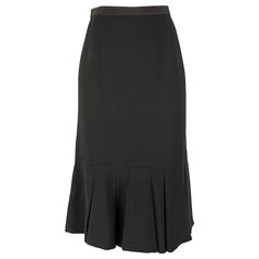 PRADA tulip skirt comes in a black acetate and viscose material featuring a ruffled hem, and a side seam invisible zip up closure. Made in Italy.Good Pre-Owned Condition. Moderate Fading at waistband. As- is. Marked: 40 Measurements: Waist: 28 inches Hip: 40 inches Length: 26 inches Reference: 119248 Category: Skirt More Details Brand: PRADA Gender: Female Size: 4 Color: Black Fabric: Viscose / Acetate Pattern: Pleated Style: Tulip Age Group: Adult Tulip Skirt, Invisible Zip, Black Fabric, A Black, Pleated Skirt, Tulips, Prada, Zip Ups, In Italy