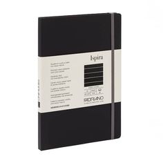 a black and white notebook with writing on the front, sitting in front of a white background