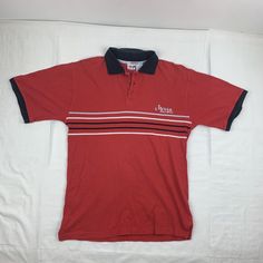 Vintage Mecca Denim Brand Polo Shirt Adult Small Red Striped Collared Y2K Grunge. This is a pre-owned item. Please see photos for reference on the condition of the item. I try my best to disclose any flaws I may find, however due to the nature of pre-owned items, I am bound to miss small imperfections. Some discoloring spots on the front and back. Vintage or pre-owned clothes tend to fit different than present day or brand new clothes. Please see measurements in the photos to confirm sizing. THI Retro Red Cotton Shirt, Red Collared Sporty Shirt, Sporty Red Collared T-shirt, Retro Red Shirt For Streetwear, Red Collared Shirt For Streetwear, Red Collared Cotton T-shirt, 90s Style Red Cotton Shirt, 90s Red Shirt For Streetwear, 90s Red Streetwear Shirt