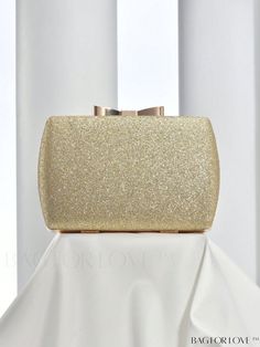 BagForLove - Mini Glamorous Glitter Box Bag: Ideal Bridal Purse for Weddings, Proms & Parties Product Description Color Gold Details Glitter Magnetic No Strap Type Chain Bag Size Mini Style Minimalist Pattern Type Plain Type Box Bag Closure Type Kiss Lock Material Glitter Composition 100% Polyester Care Instructions Do not wash Size Chart INCH CM Bag Height Bag Length Bag Width Strap Length 4.9 inch 7.5 inch 2 inch 47.2 inch Bag Height Bag Length Bag Width Strap Length 12.5 cm 19 cm 5 cm 120 cm Details Pictures Similar Products h2 { text-align: center; } /* æ¢è¡ */ li{ white-space: normal; word-break: break-all; word-wrap: break-word; } .red-box { width: 100%; display: flex; flex-direction: row; flex-wrap: wrap; justify-content: center; } .red-box > div { width: 190px; height: 250px; mar Types Of Kisses, Bridal Purse, Rose Party, Minimalist Pattern, Word Wrap, Box Bag, Chain Bag, Prom Party, Style Minimalist