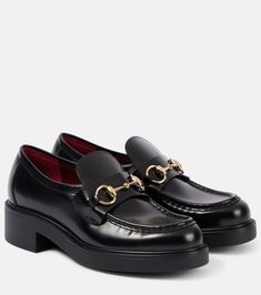 Horsebit leather loafers in black - Gucci | Mytheresa Calf Leather Round Toe Loafers For Galas, Derby Round Toe Loafers With Leather Lining, Derby Loafers With Leather Lining And Round Toe, Round Toe Loafers For Derby, Business Platform Loafers With Round Toe And Leather Sole, Derby Loafers With Rubber Sole And Flat Heel, Business Leather Slip-on Shoes With Lug Sole, Business Slip-on Leather Shoes With Lug Sole, Luxury Leather Slip-on Shoes With Round Toe