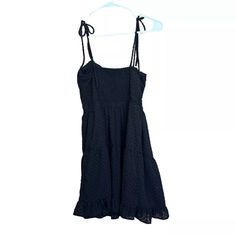 Add A Touch Of Sophistication To Your Summer Wardrobe With This Wild Fable Black Dot Texture Spaghetti Strap Mini Dress. The Dress Features A Sweetheart Neckline, Tie Closure, And A Fit & Flare Style That Flatters Your Figure. Black Sundress With Adjustable Straps, Black Sundress With Tie Straps, Black Mini Sundress With Adjustable Straps, Black Summer Sundress With Tie Straps, Black Sundress With Tie Straps For Summer, Black Tie Straps Sundress For Summer, Spaghetti Strap Summer Dress, Dot Texture, Spaghetti Strap Mini Dress