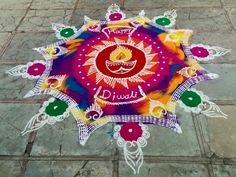 a colorful design on the ground that says diwal