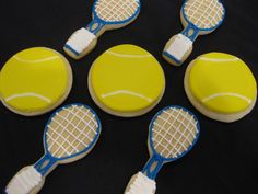 tennis themed cookies are arranged in the shape of tennis balls and racquets