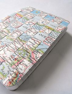 a close up of a cell phone case with a map design on it's cover