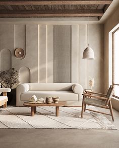 a living room with two couches and a coffee table in front of a window