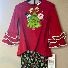 Adorable Christmas Outfit By Rare Editions! 2 Pieces. Red Tunic Top With White Trim And Ruffle Accents. Santa Claus, Snowman, And Christmas Tree Decals. Black Leggings With Tree, Presents, Ornaments, And Candy Cane Pattern. Nwt! Authentic I Am A Posh Ambassador, So Purchase With Confidence No Tradesno Pplno Low Balls Playful Long Sleeve Holiday Sets, Casual Long Sleeve Christmas Sets, Christmas Cotton Sets For Festive Occasion, Cotton Festive Holiday Sets, Cute Cotton Holiday Sets, Cute Cotton Sets For Holidays, Casual Cotton Sets For Holiday, Casual Cotton Holiday Sets, Playful Long Sleeve Holiday Tops