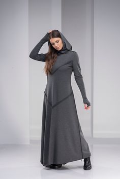 "Plus Size Maxi Dress, Gothic Hoodie Dress, Women Winter Dress ♠ This sleek maxi length dress will easily become your favorite for the season! Featuring a shawl hood, extra long sleeves with thumb-hole cuffs and an asymmetric hem, this piece feels unique, yet minimalist. The soft cotton blend material hugs the body and compliments it at all the right places. ♠ Sizes The model on the picture is wearing size S. Have a look at my Size Chart below to make sure your piece will fit you best. ** PLEASE Fitted Gray Maxi Dress For Winter, Winter Long Sleeve Cotton Maxi Dress, Winter Cotton Maxi Dress With Long Sleeves, Cotton Long Sleeve Maxi Dress For Winter, Boho Winter Dress, Boho Dress Winter, Long Sweatshirt Dress, Modest Dresses For Women, Winter Maxi