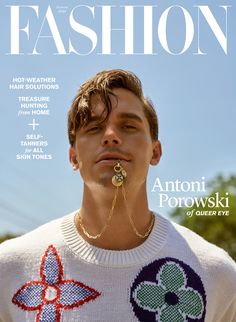 a man with piercings on the cover of fashion magazine