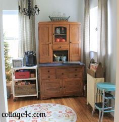 a living room filled with furniture and a christmas tree