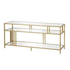 a gold metal and glass console table with shelves on each side, against a white background