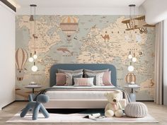 a bedroom with a map wallpaper and teddy bear