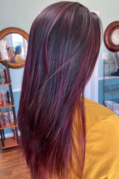 Woman with brown hair and striking purple balayage highlights. Caramel Chunky Highlights, Ashy Babylights, Purple Chunky Highlights, Brown Hair With Purple Highlights, Brown Hair With Purple, Hair With Purple Highlights, Grown Out Highlights