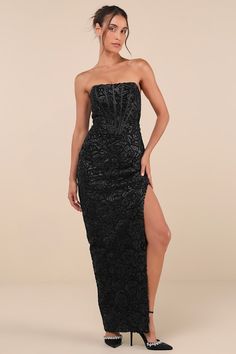 Show off your regal style in the Lulus Stately Aura Black Mesh Velvet Strapless Bustier Maxi Dress! This unique dress has a mesh knit overlay that boasts a velvety floral-like design, adorned with glittery black sequins. A sweetheart-style neckline (with hidden no-slip strips) tops a bustier-style bodice with lightly padded cups, supportive boning, and a trendy Basque waist. Figure-skimming column skirt falls to an elegant maxi hem with a thigh-high side slit. Hidden back zipper/clasp. Fit: This Regal Style, Basque Waist, Strapless Bustier, Column Skirt, Stripped Tops, Unique Dress, Fall Skirts, Strapless Bra, Unique Dresses