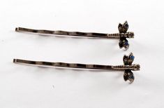 "For sale is a pair of vintage hair pins. These hair pins are silver tone metal with blue rhinestone fire fly ends.  A beautiful design to compliment that special hair style. The bobby pins measure 2\" long.  Please note there could be blemishes in the finish. New treasures added all the time. Check back often!" Bobby Pins Aesthetic, Vintage Hair Pin, Cute Barrettes, Vintage Hair Pins, Fire Fly, Goth Accessories, Tortoise Color, Vintage Hair Accessories, Vintage Hair