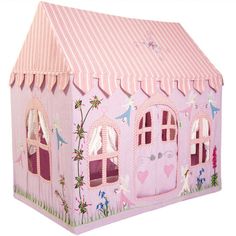 a pink doll house with lots of windows