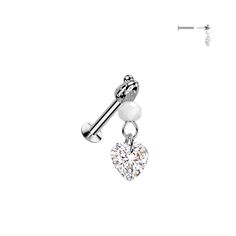 316L Surgical Steel Threadless Push In Convex Back Stud With CZ Heart And Glass Bead Dangle Select Bar Length in 5/16" (8 mm) Gauge: 16GA (1.2mm) & 18GA (1mm) Piercing Area: Ear Cartilage, Labret, Monroe, Tragus, Cartilage, Helix Material: 316L Surgical Steel/Brass Stone Material: CZ Sold by: 1 Pc Mid Finger Rings, Ear Piercings Cartilage, Labret Studs, Tragus Piercing, Piercing Ring, Plugs Earrings, Nose Ring Stud, Stone Material, Cartilage Piercing