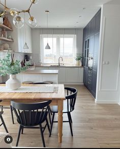 the kitchen is clean and ready to be used as a dining room or living room