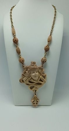 This great art deco celluloid French necklace looks great and is in overall good condition with no apparent damages or repairs. The pendant measures 4 1/2" high and about 2 5/8" at its widest. One side of the necklace measures about 9 5/8" to the end of the hook with the other side measuring about 9". This is a very desirable piece with an incredible look. Collectible Art Deco Carved Jewelry, Collectible Art Nouveau Carved Jewelry, Art Deco Carved Collectible Jewelry, French Necklace, Art Nuevo, French Art Deco, Portsmouth, To The End, French Art