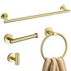 an image of bathroom accessories set with towel and toilet paper holder in gold color on white background