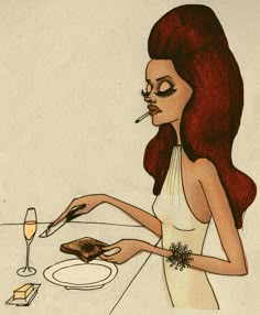 a woman sitting at a table eating cake and drinking wine