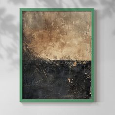 a painting hanging on the wall in a room with white walls and green trimmings