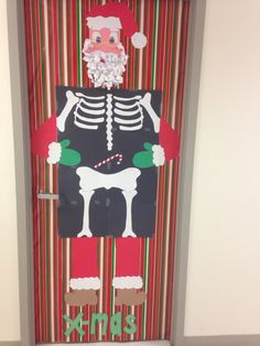 a door decorated to look like santa clause