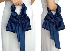 Navy navy blue bag knot satin bag purse, wedding bow bag, party nandbag, elegant clutch,Handmade bag for event party, Satin Evening Bag Gift I invite you to check out this charming handbag for women, which is made of exquisite satin (satin) and is designed to emphasize your unique beauty and elegance.  This handbag is ideal for those who value quality and style.  Features:  * Material: satin (satin)  * Fastener: metal button fastener  * Dimensions: width 23 cm / 9 inches, height 18 cm / 7 inches Elegant Party Bag With Satin Bow, Elegant Evening Bag With Satin Bow, Elegant Formal Bag With Satin Bow, Elegant Evening Bags With Satin Bow, Elegant Party Bags With Satin Bow, Elegant Bag With Ribbon For Gift, Elegant Bags With Bow For Events, Elegant Bag With Detachable Bow For Gift, Elegant Bag With Detachable Bow As Gift