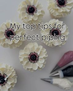 some white flowers with black centers on them and the words, my top tips for perfect piping