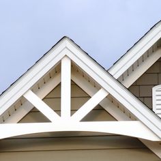 the roof of a house with a clock on it