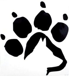 a black and white photo of a cat's paw print on a piece of paper