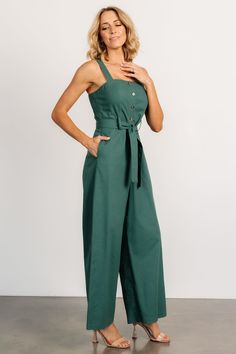 Baltic Born exclusive style Adorable jumpsuit for a day out on the town Deep Kelly green color Linen blend material has no stretch Straight neckline Functional buttons down bodice Tank sleeves Hidden pockets on both sides Removable self-tie belt at waist Wide-leg pant style Unlined Trina is 5'6, cup size 32D, size 2 and is wearing size S Green Jumpsuits And Rompers For Work With Button Closure, Fitted Green Jumpsuit With Pockets, Casual Green Jumpsuits And Rompers For Work, Fitted Green Jumpsuits And Rompers For Day Out, Casual Green Jumpsuits For Workwear, Fitted Green Jumpsuits For Day Out, Chic Green Strapless Jumpsuit, Green Buttoned Jumpsuits And Rompers, Sleeveless Green Jumpsuits And Rompers For Work