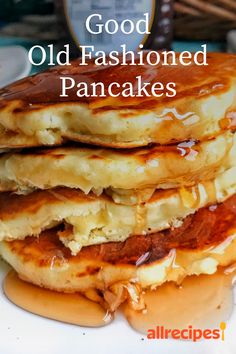 pancakes stacked on top of each other with syrup