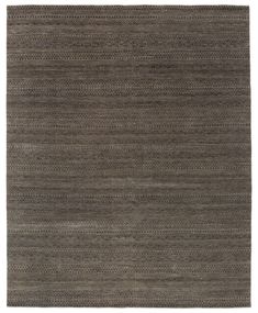 an area rug with grey and black stripes