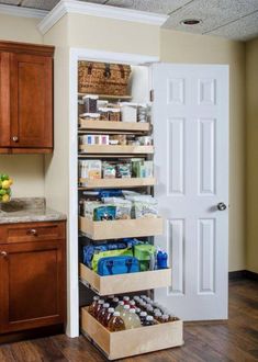 the kitchen pantry is organized and ready to be used as a storage area for food