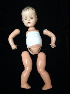 a baby doll is wearing a diaper