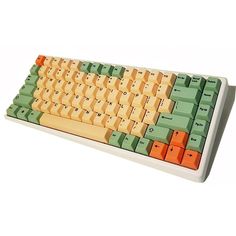 an orange and green computer keyboard on a white surface