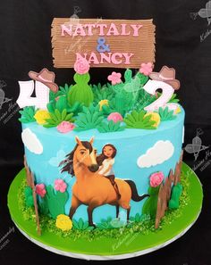 a birthday cake decorated with a horse and rider on the front, name nattaly & fancy