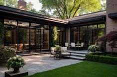 an outdoor patio with chairs and tables