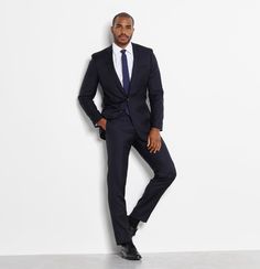 The only thing more stepped up than a navy suit is a tuxedo. So if you're looking for elevated style, without going full-on black tie congrats, you've found your match. Includes jacket and pants. Pants are available in classic and slim fits. 100% super-fine Italian merino wool Two-button closure Notch lapels Side vents Fully canvassed Las Vegas Outfit Men, Suit Prom, Types Of Suits, Tailor Made Suits, Black Tux, Navy Blue Suit, Suit Black, Navy Suit, Black Suit